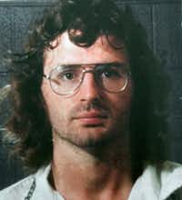 Branch Davidian leader David Koresh in a police line-up following a 1987 gunbattle between Davidians.&nbsp;(AP Photo/Waco Tribune-Herald)